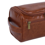 detalhe da alça de transporte da necessaire basicalle go na cor marrom